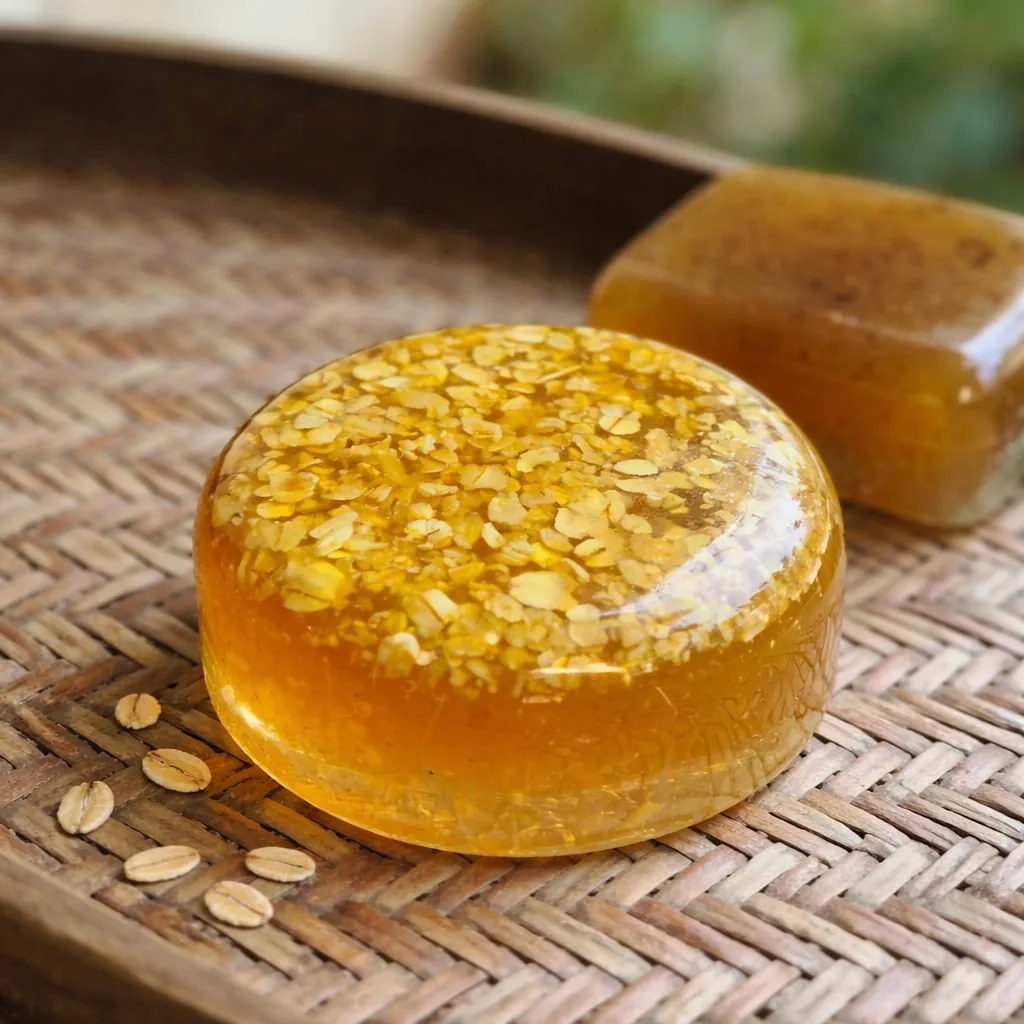 A honey oats bar resting on a woven tray